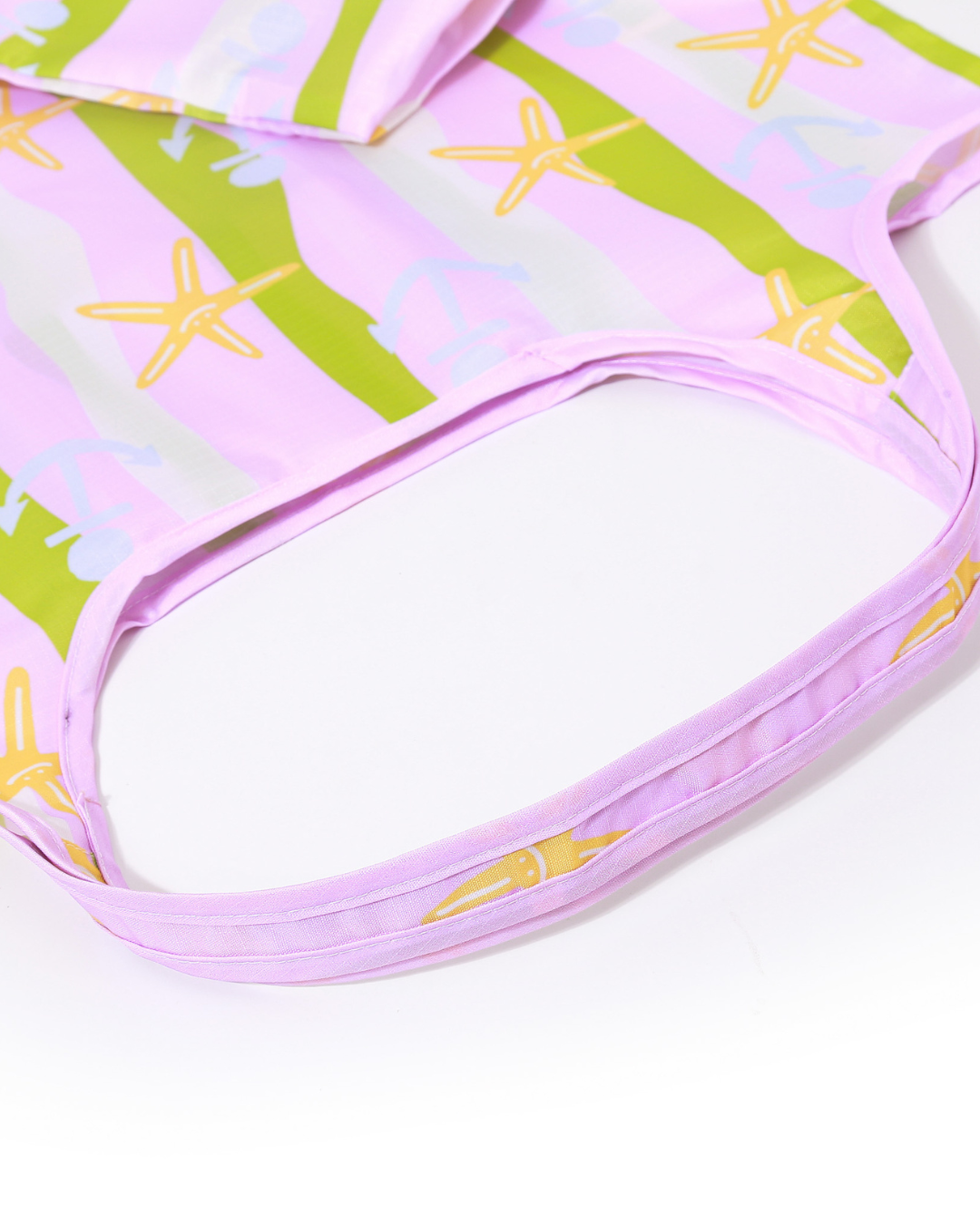 close up view of the handles with starfish pattern on a white background