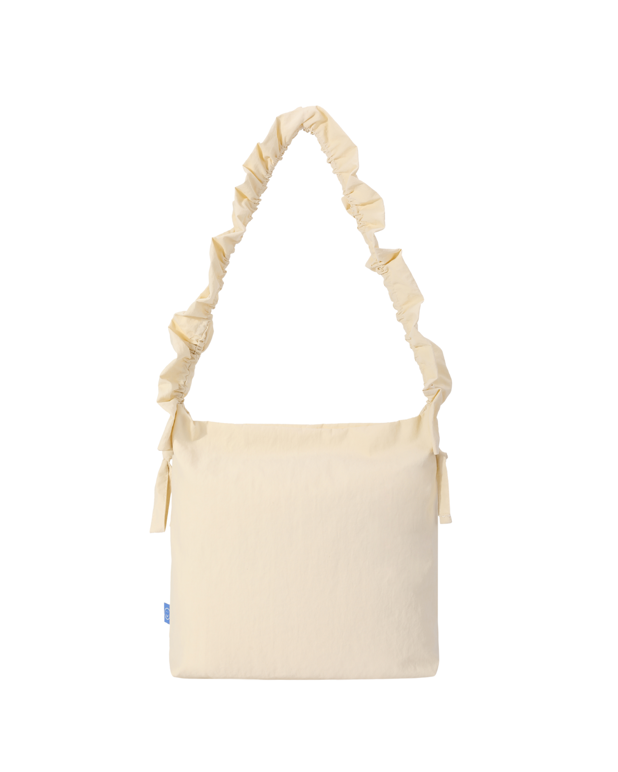 front view of the cream petal sling shoulder bag