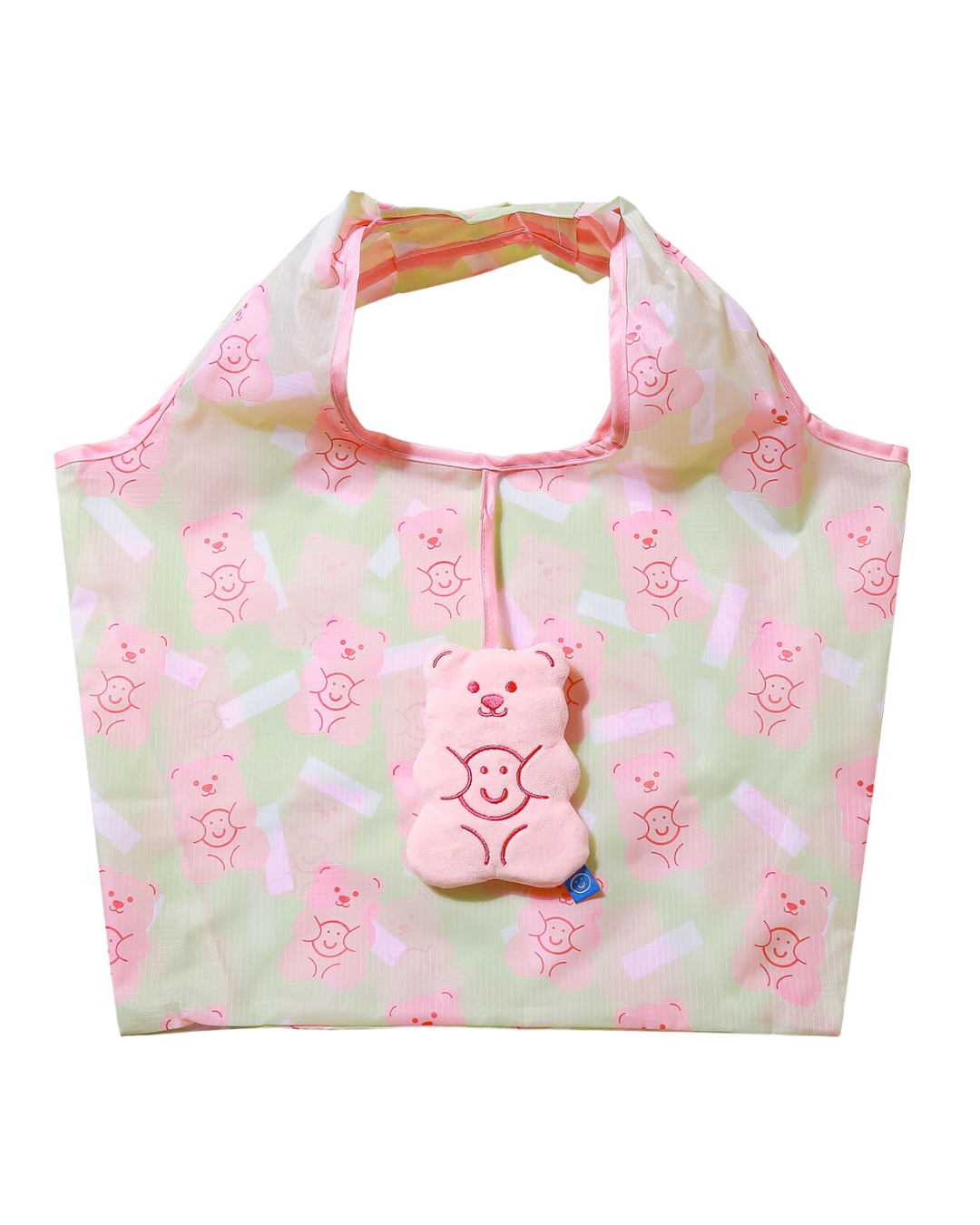 A gummy bear plushie with an attached reusable bag