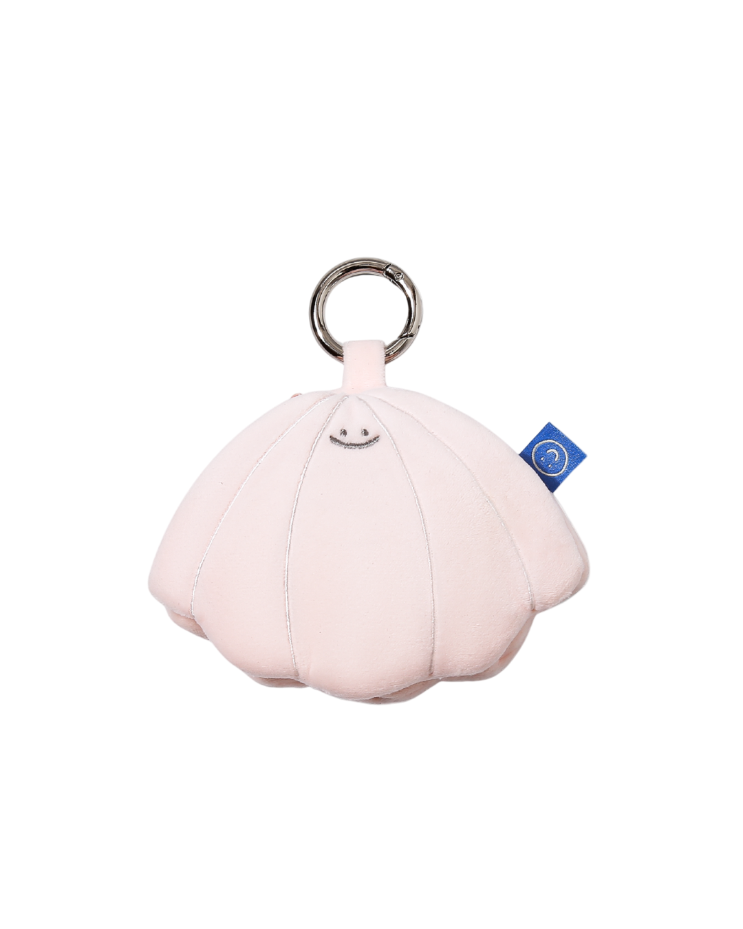 cute beige, pink seashell plushie smiling