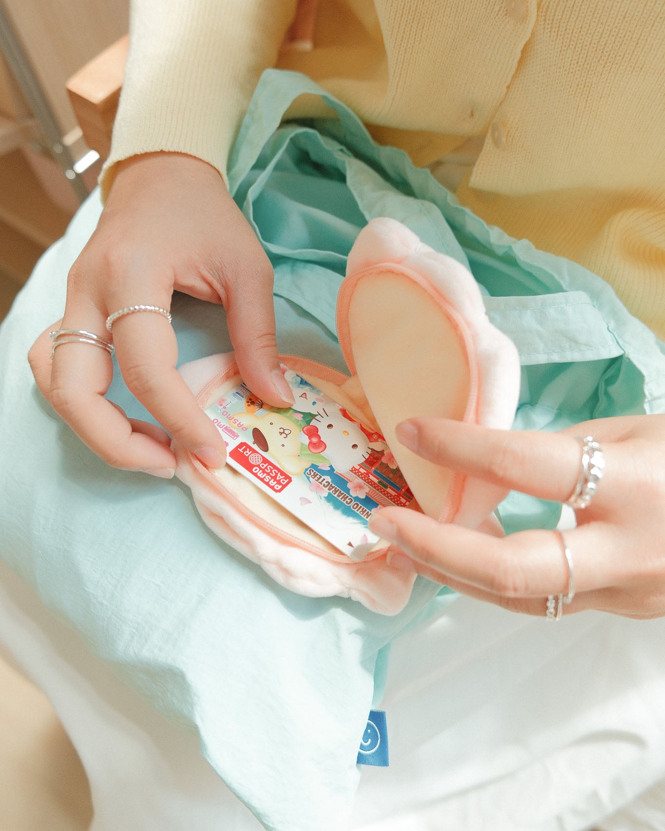storing a card in the seashell plushie