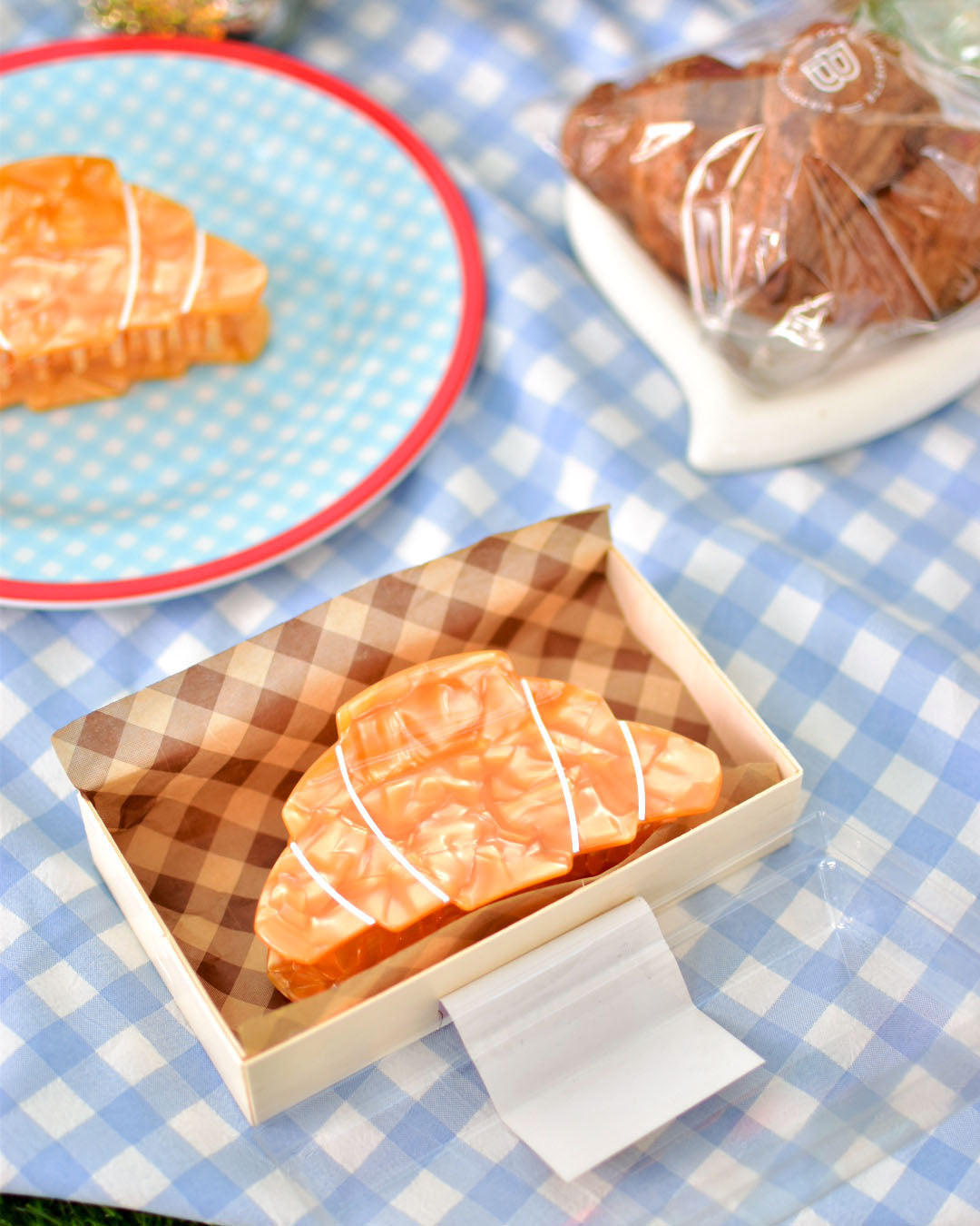 Croissant hair claw clip in a box