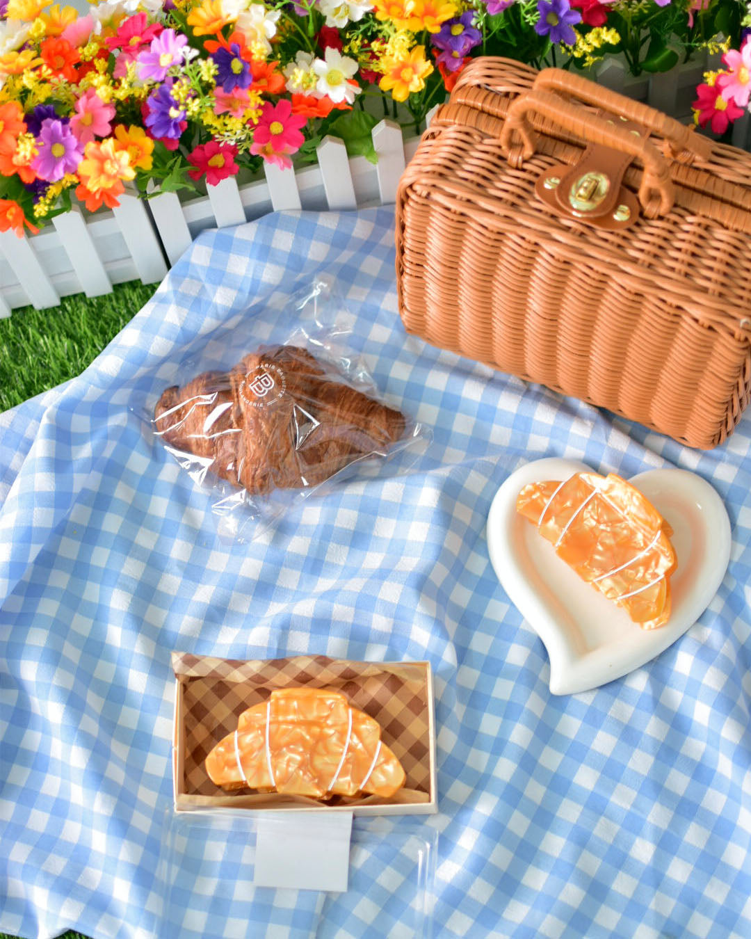 a picnic set up with croissants