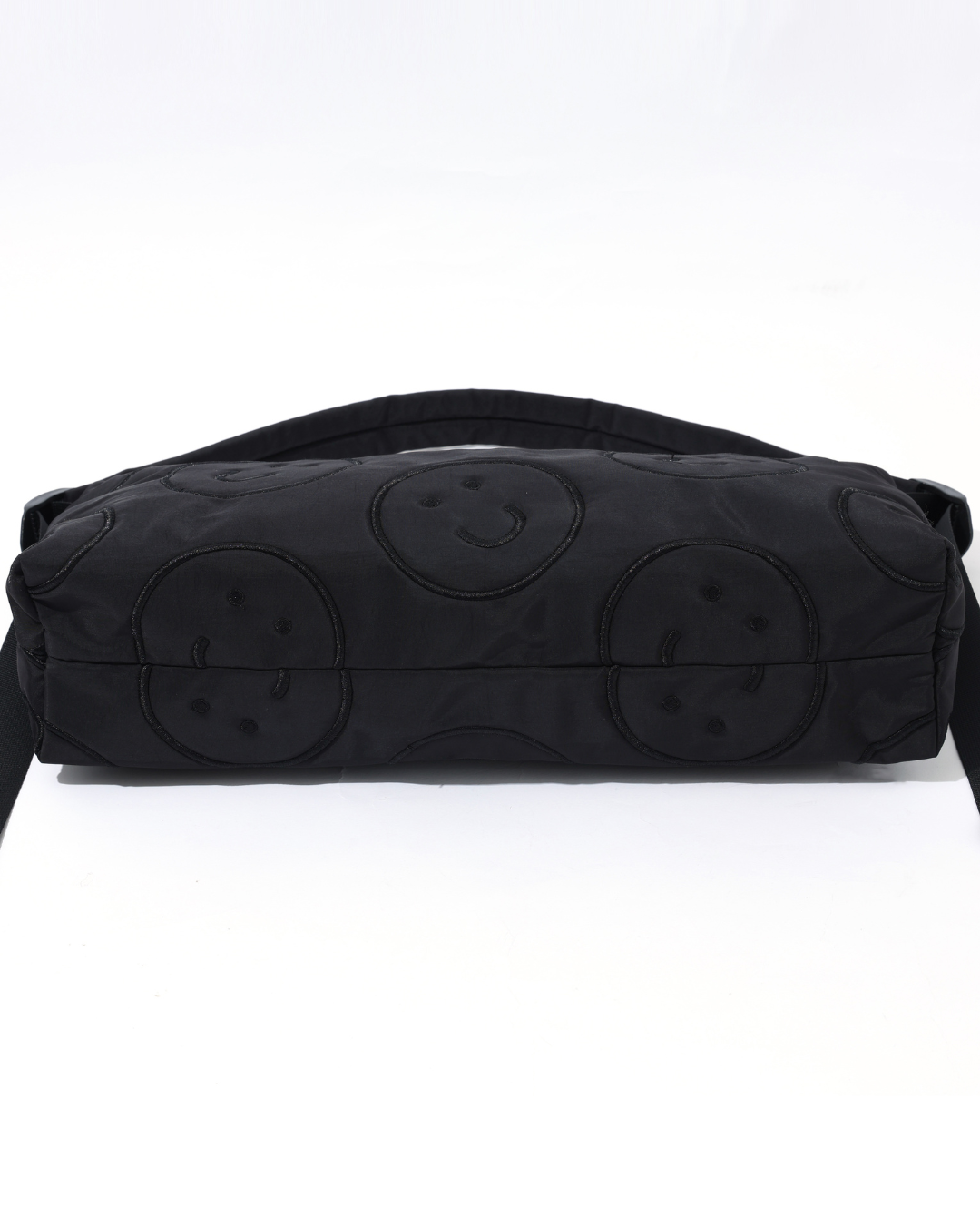 Signature Smile Embroidery Bolster Bag in Black