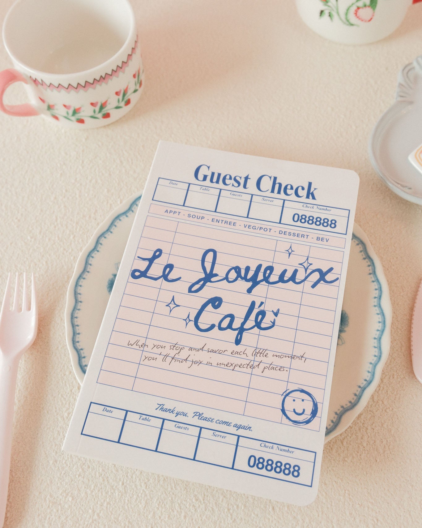 A notebook laid on a plate