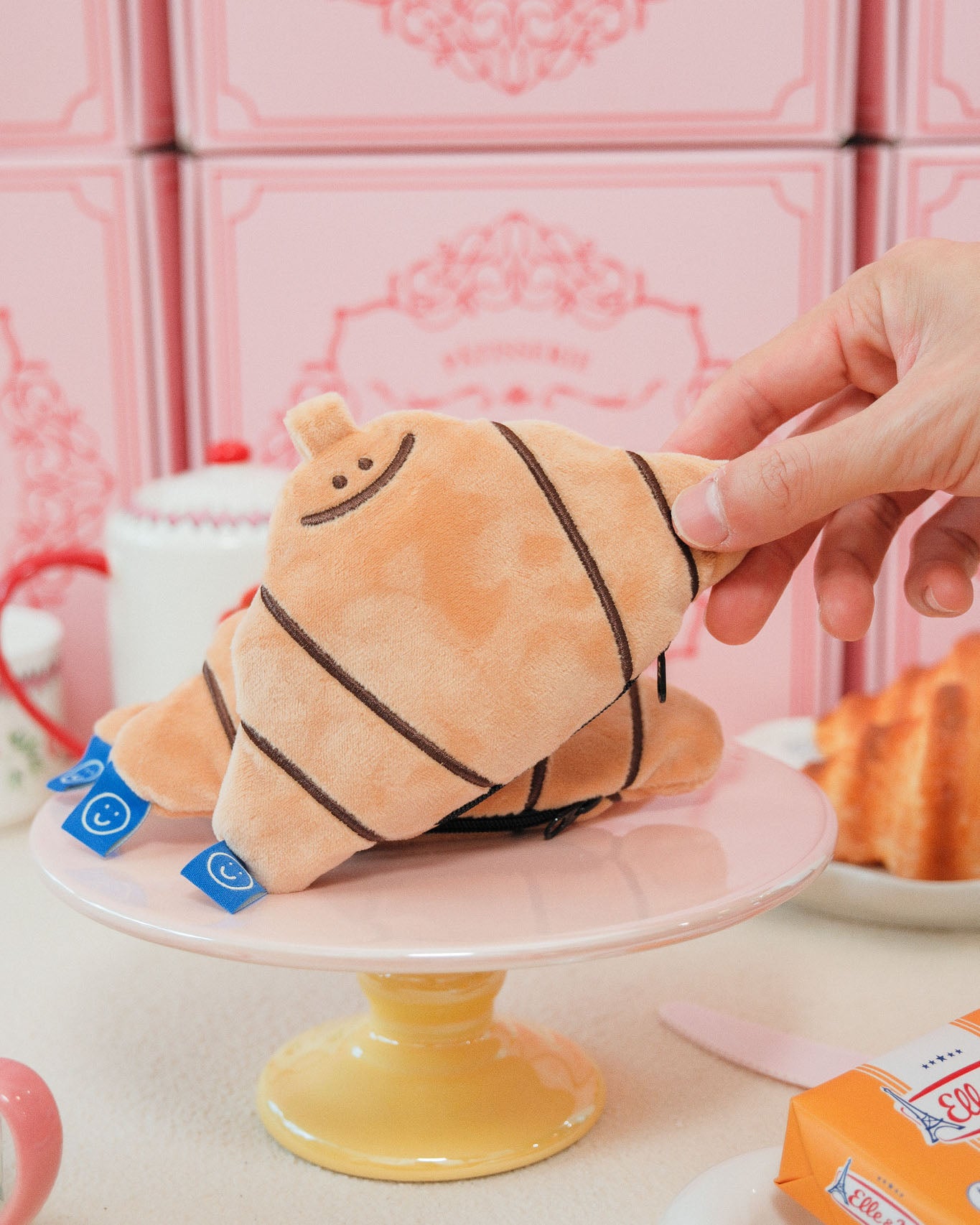 croissants lined up on a pastry table mocking a pastry bar