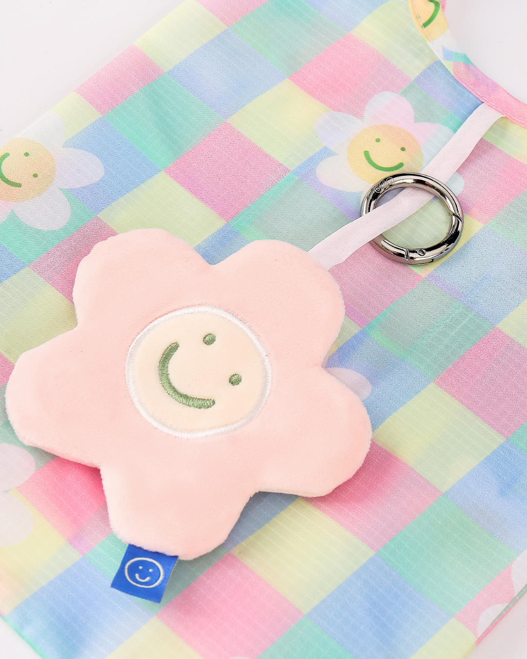 Close up view of pink flower plushie