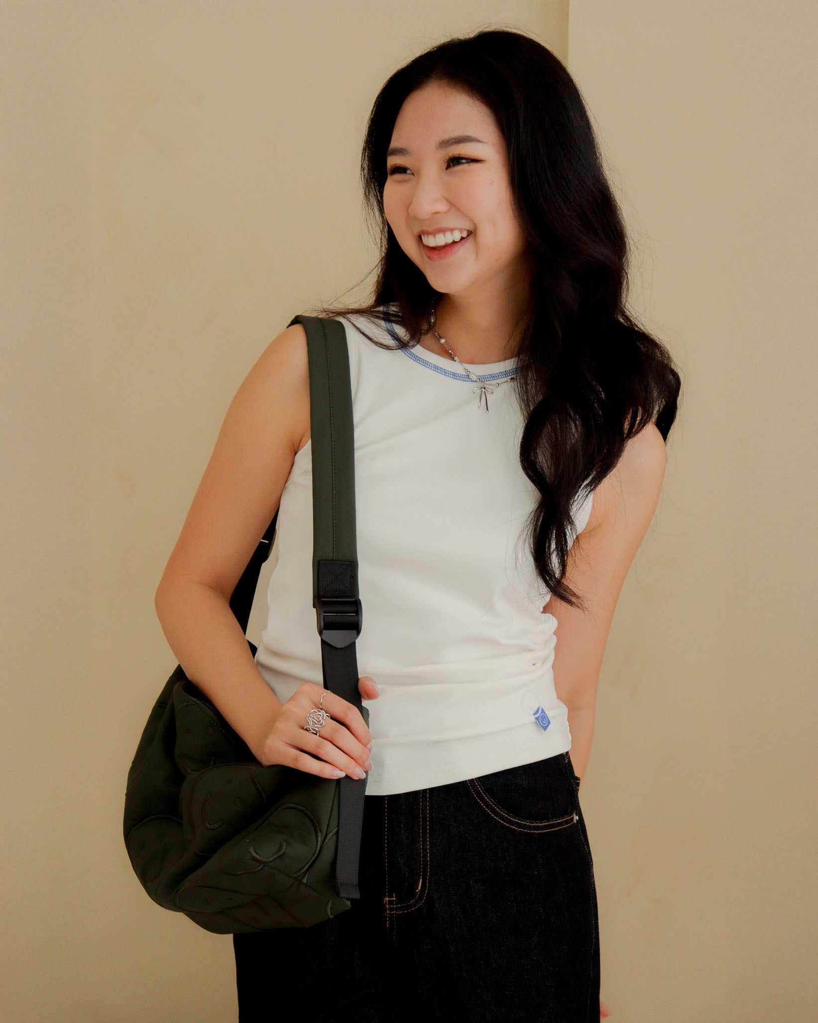 Signature Smile Embroidery Bolster Bag in Olive