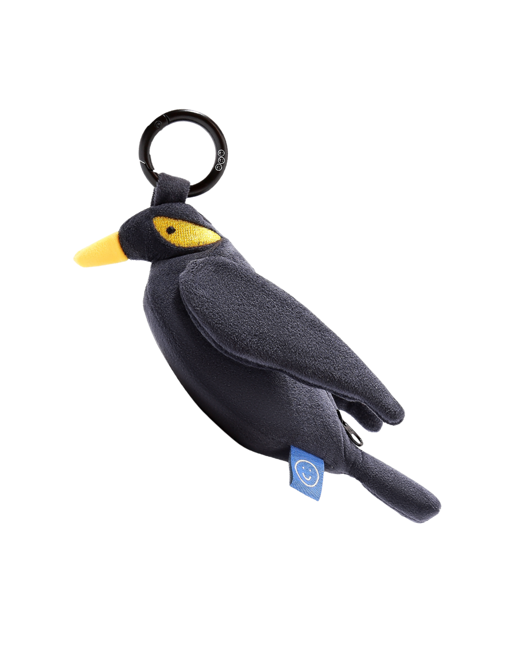 Black bird-shaped Mynah plushie reusable bag keychain with a yellow beak on a white background