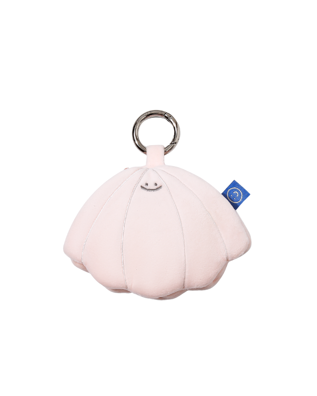 cute beige, pink seashell plushie smiling