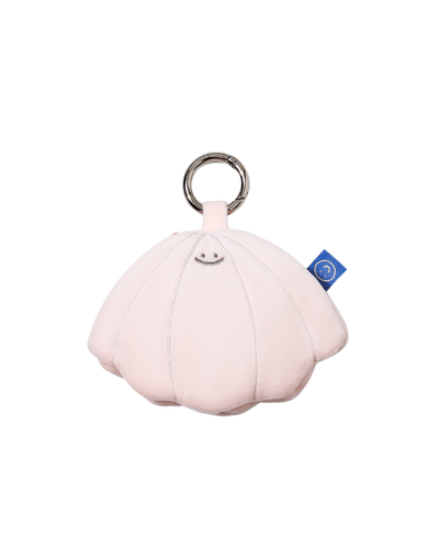 cute beige, pink seashell plushie smiling