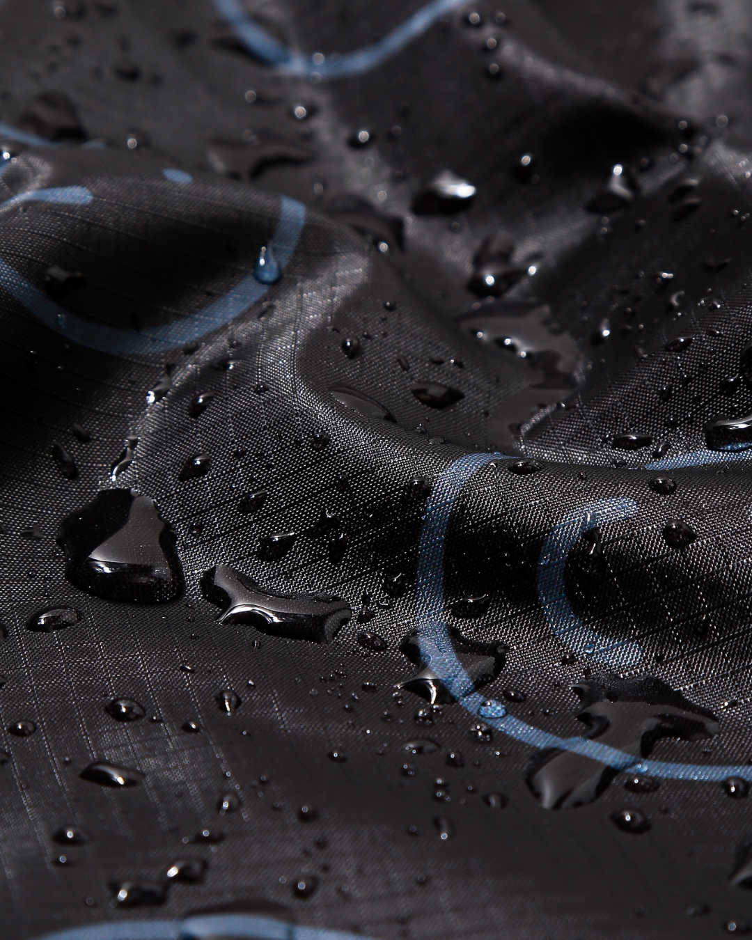close up look at the waterproof property of the bag with droplets