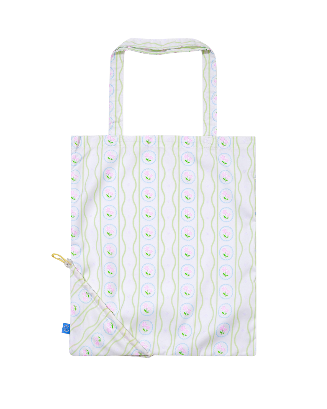 Tote bag with an old english floral pattern on a white background