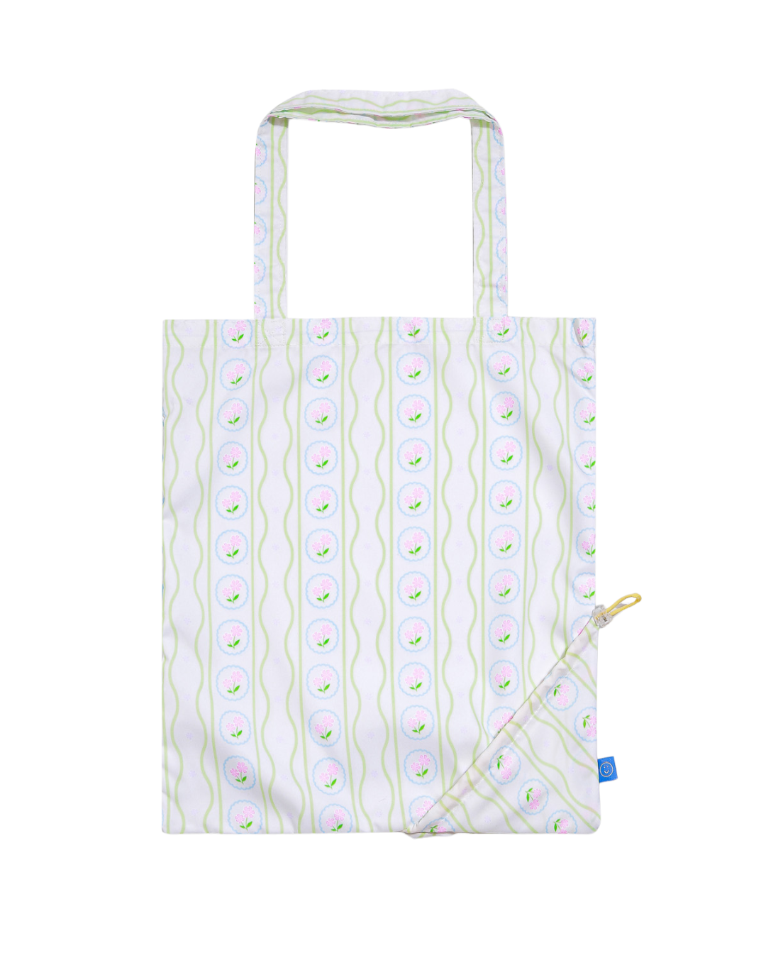 Tote bag with an old english vintage floral pattern on a white background