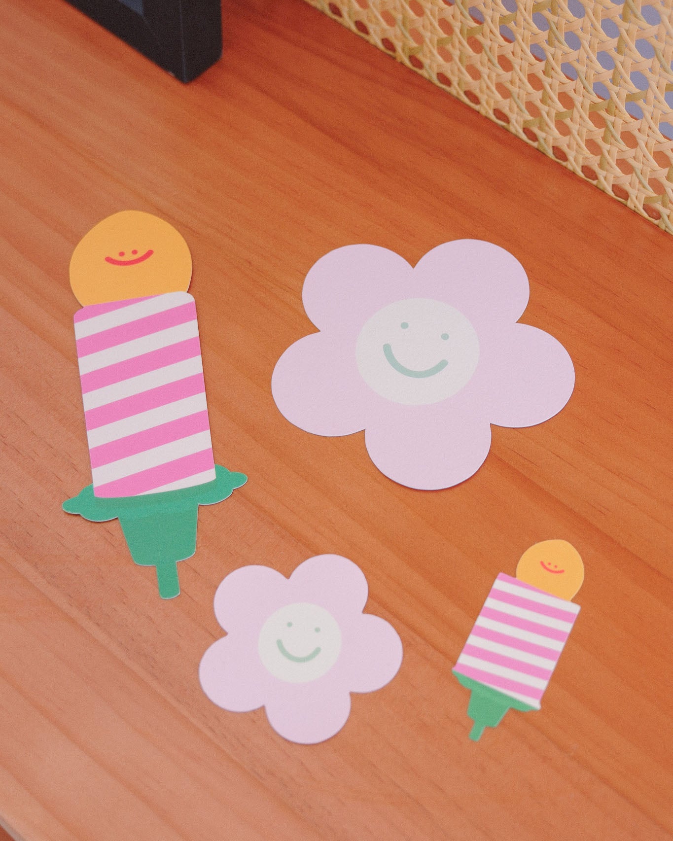 smiling pink flowers with birthday candles