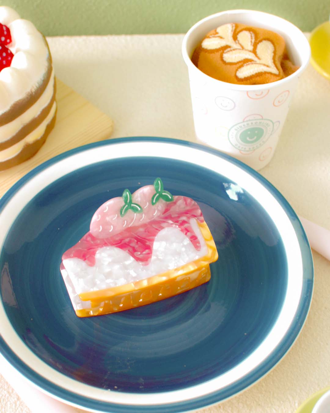 strawberry cheesecake claw clip on a plate