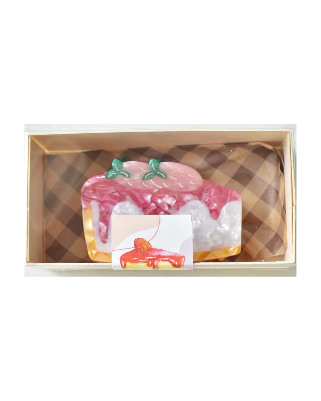 strawberry cheesecake claw clip packaged in a box