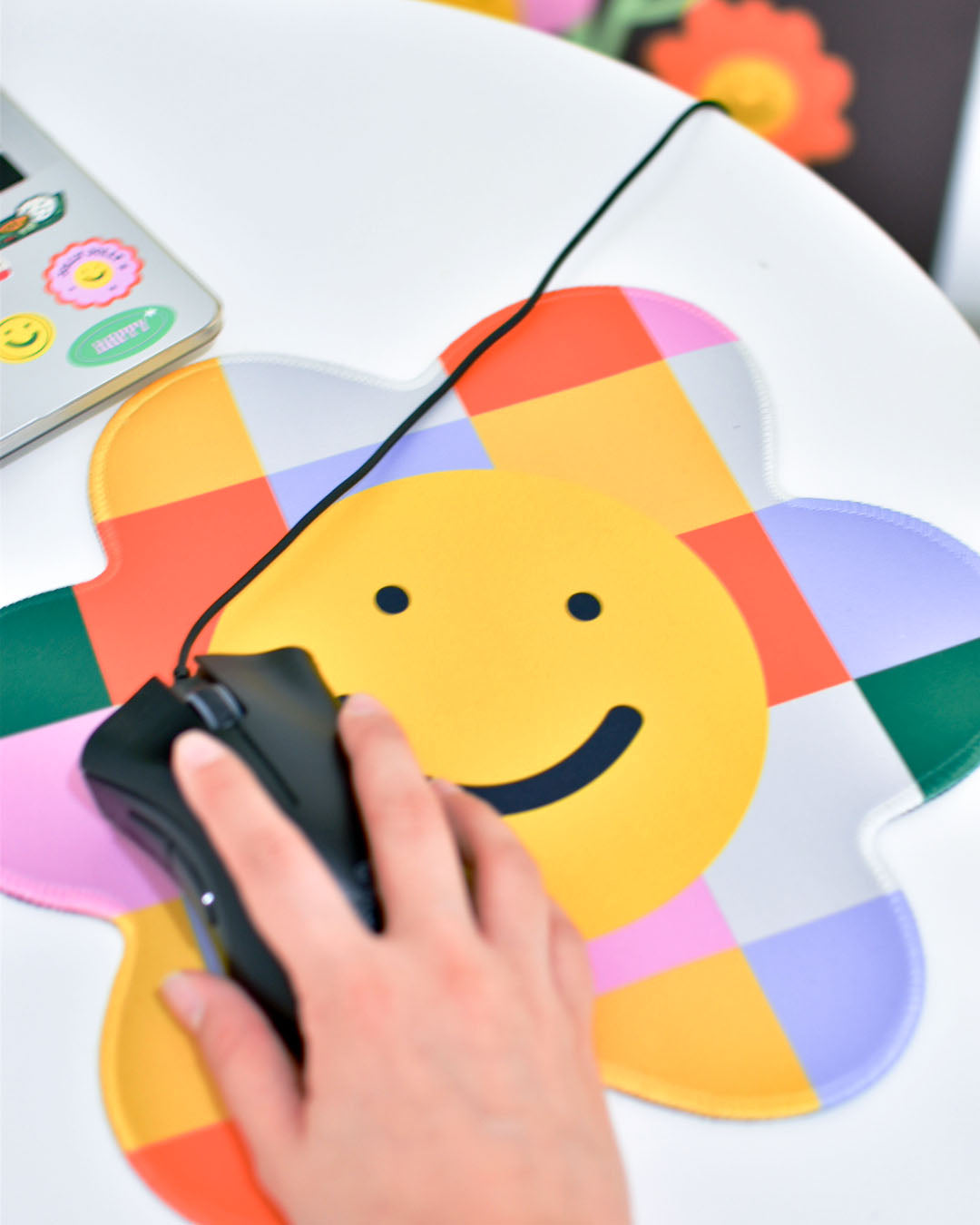  a close up view of a person using the mouse on the mousepad